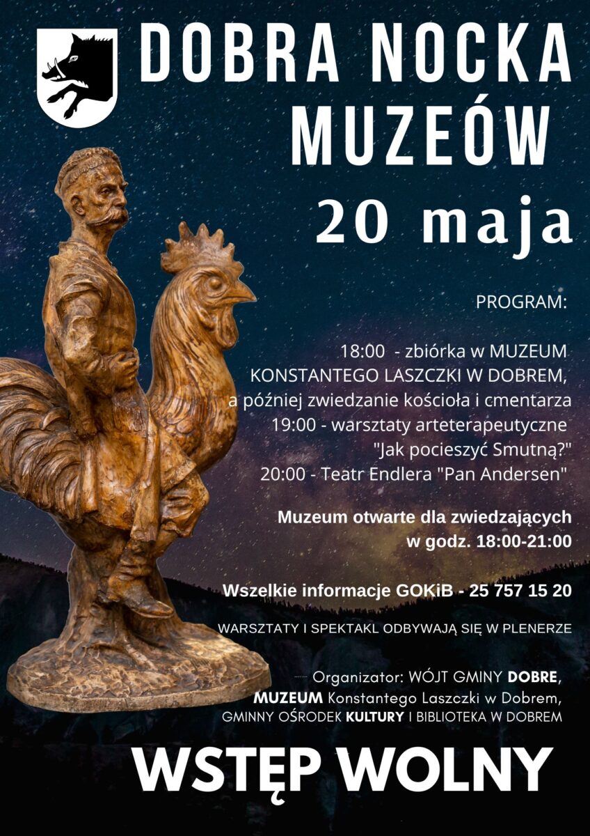 Twardowski Na Kogucie - Rzeźba obok napis z białymi literami Dobra Nocka Muzeów